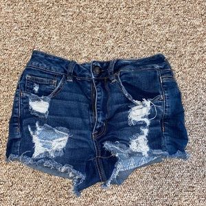 Distressed denim shorts